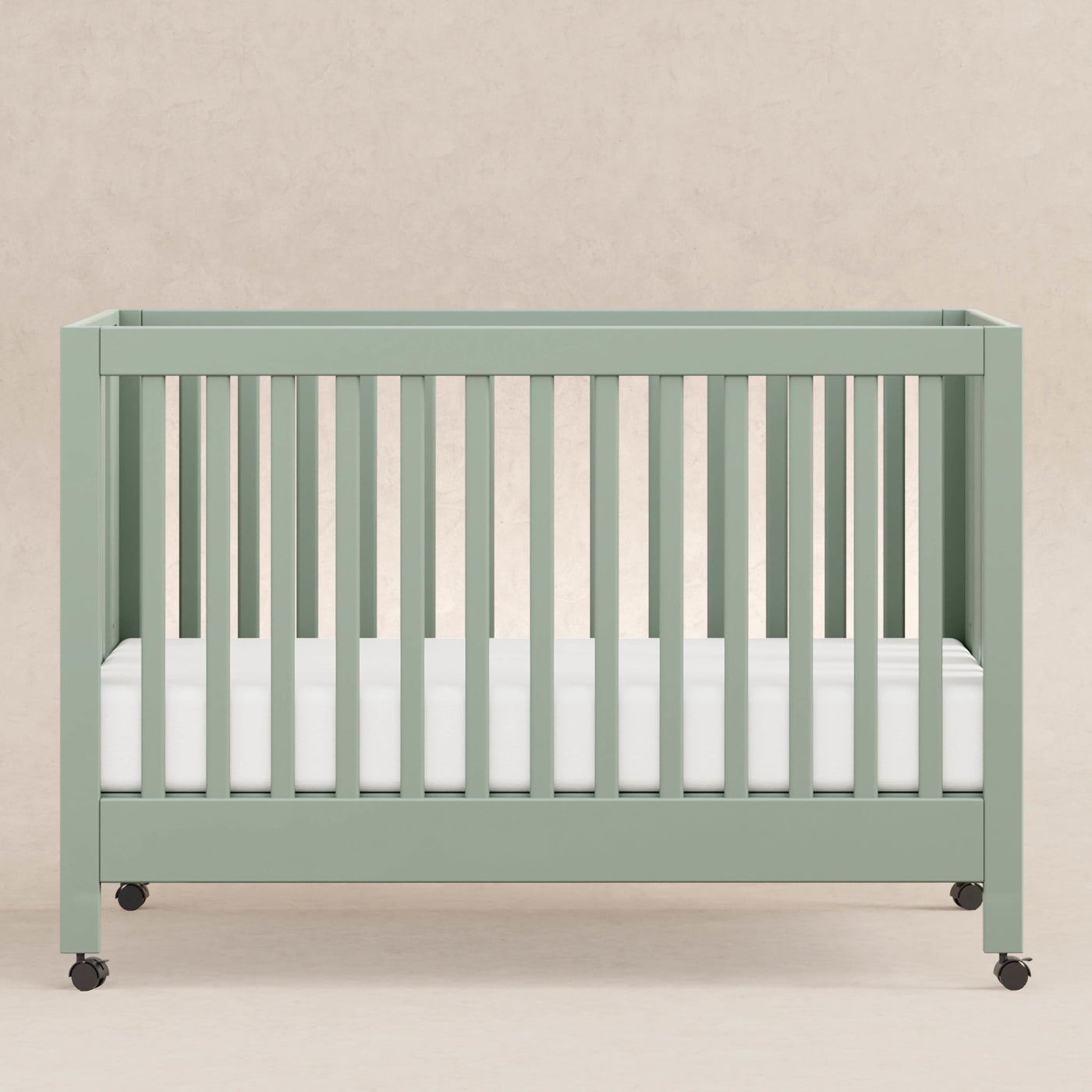 Babyletto Cribs Light Sage Babyletto Maki Portable Folding Crib with Toddler Bed Conversion Kit
