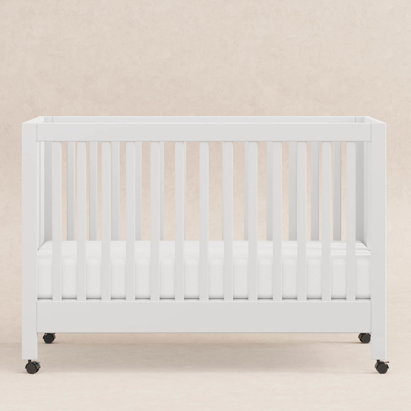 Babyletto Cribs White Babyletto Maki Portable Folding Crib with Toddler Bed Conversion Kit